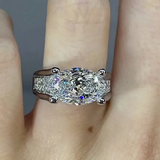 Victoria – Radiant ring with side embellishments.