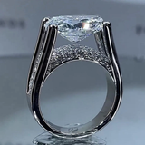 Victoria – Radiant ring with side embellishments.