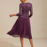 Midi dress with lace and three-quarter sleeves