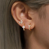 Eva-Marie – Elegant gold earrings with a fluid design.