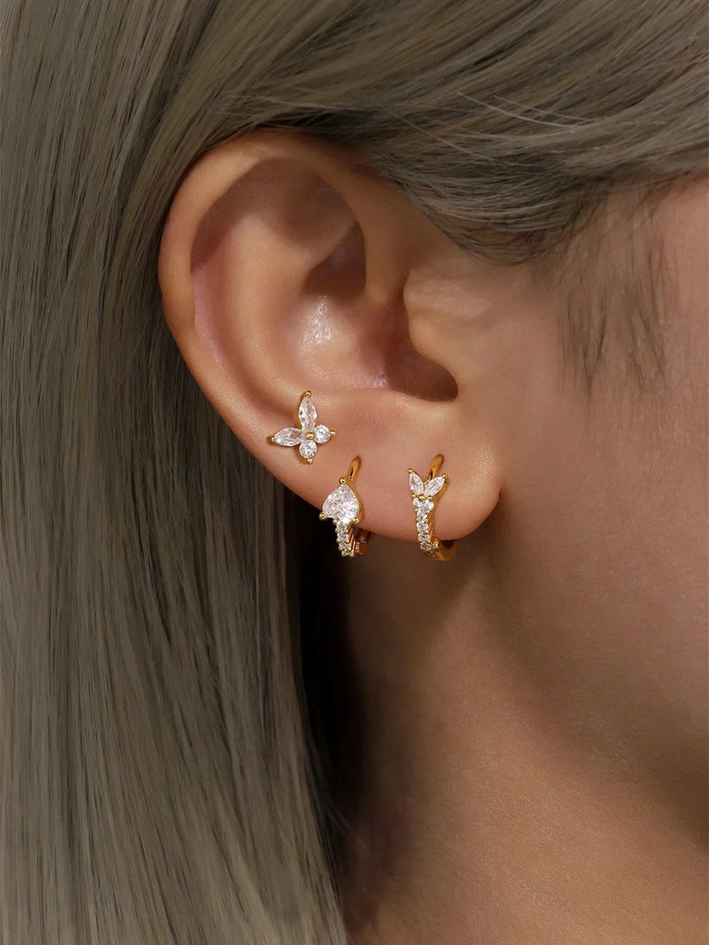 Eva-Marie – Elegant gold earrings with a fluid design.