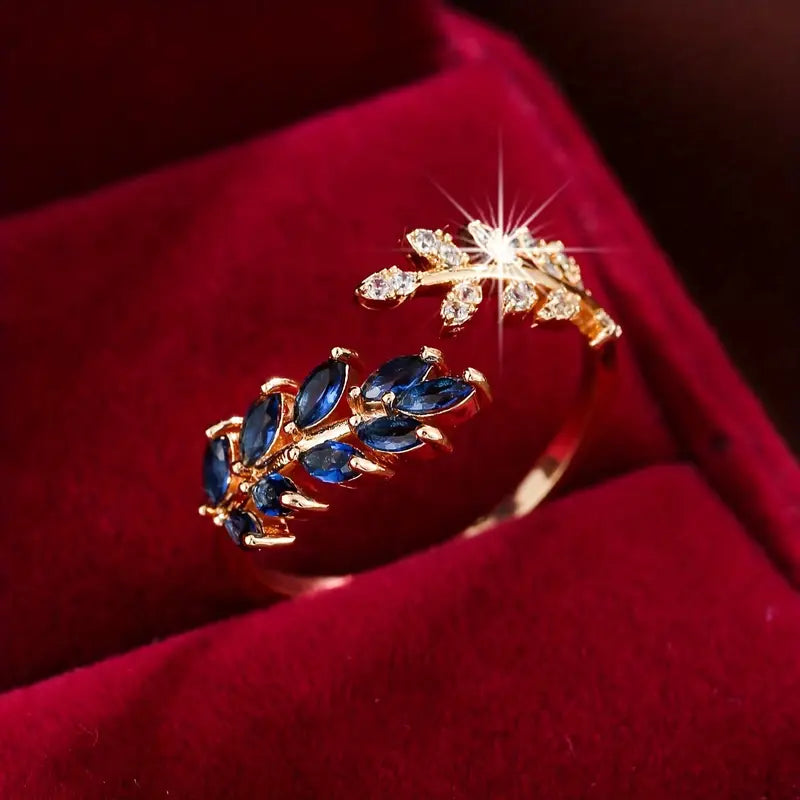 Aurelie – Red gold ring with blue gemstone
