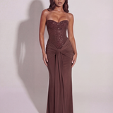 Long dress with shiny corset and draping
