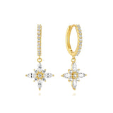 Eva-Marie – Elegant gold earrings with a fluid design.