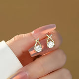 Leni – Gold earrings with cross and zirconia stones