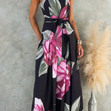 Strapless dress with a knotted waist, wide leg, and floral print