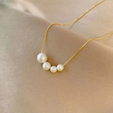 Hana – Gold necklace with rounded details