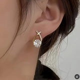 Leni – Gold earrings with cross and zirconia stones