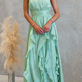 Maxi dress with halter neck and flowing ruffles
