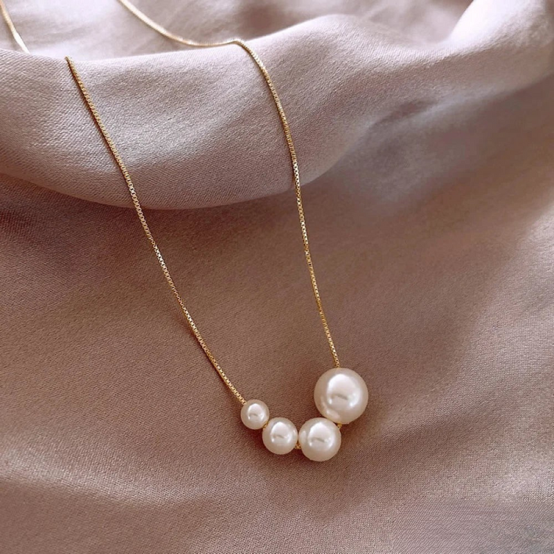 Hana – Gold necklace with rounded details
