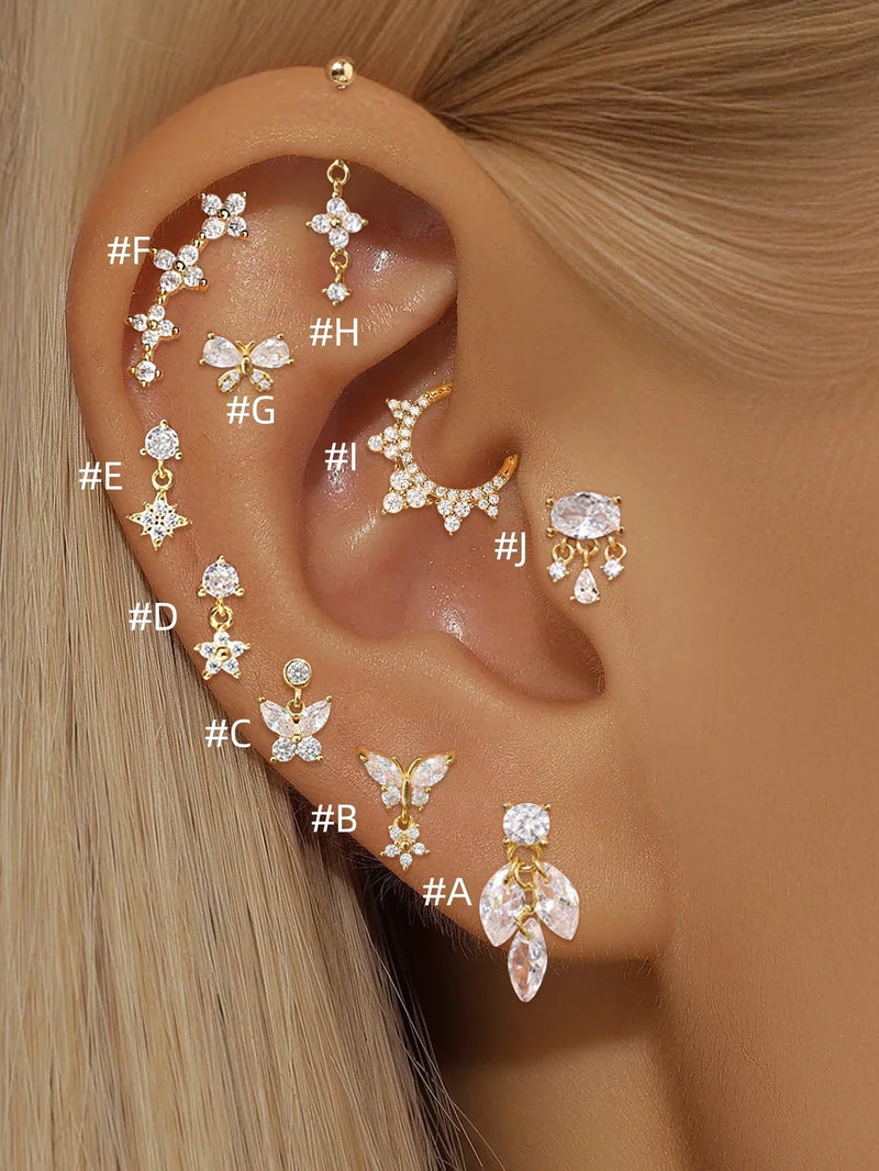Irina – Gold earrings with a structured design.