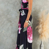 Strapless dress with a knotted waist, wide leg, and floral print