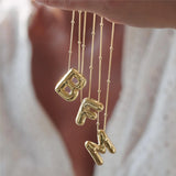Irena – Gold Necklace with Initial Charm