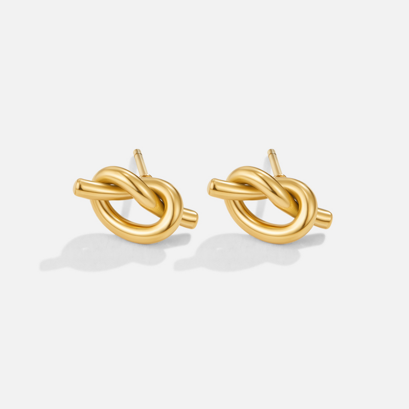 Romina – Intertwined gold earrings.