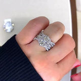Emilie – Ring with a sparkling rectangular cut diamond can be rewritten as: "Emilie Ring with dazzling rectangular cut diamond."