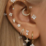 Helena – Gold earrings with a natural design.