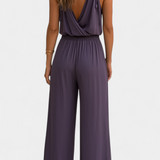 Donatila Unique Jumpsuit with Golden Details and Open Leg