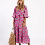 Apolline™ | Midi dress with three-quarter sleeves and V-neck print