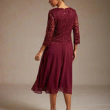 Midi dress with lace and three-quarter sleeves