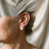 Elegant gold earrings in the shape of flower petals
