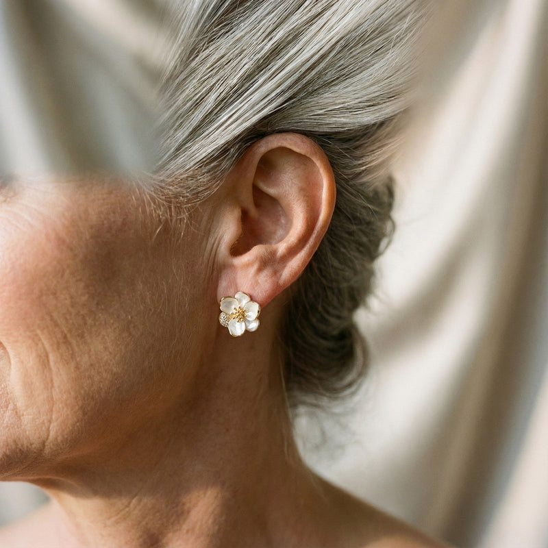 Elegant gold earrings in the shape of flower petals