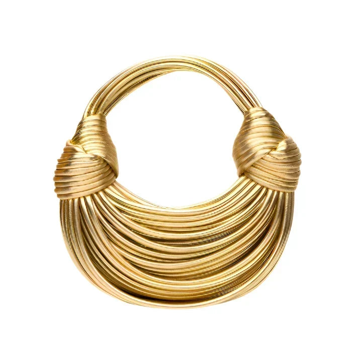 Golden sculptural design hard bag
