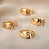 A - Gold stainless steel ring with initial letter