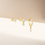 Annelie – Elegant gold earrings with filigree design.