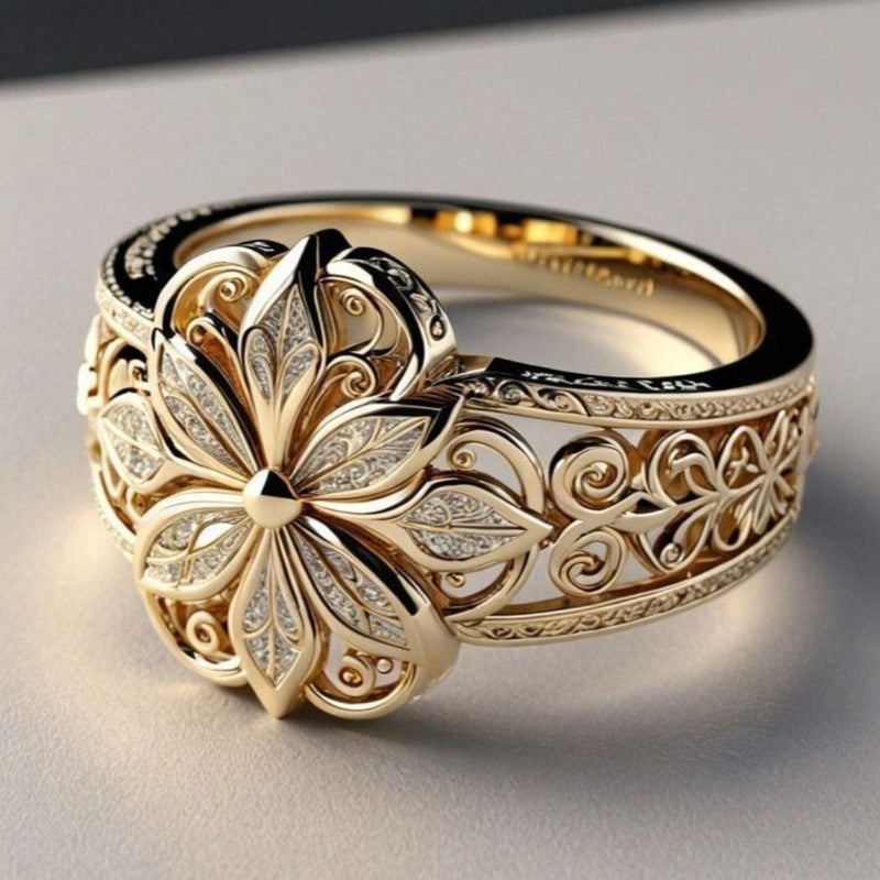 Daniela - Gold ring with exotic floral design and cubic zirconia