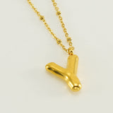 Irena – Gold Necklace with Initial Charm