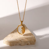 Elisabeth – Gold Necklace with Symbolic Charms