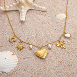 Emilie – Delicate Gold Necklace with Tiny Pendants
