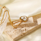 Elisabeth – Gold Necklace with Symbolic Charms