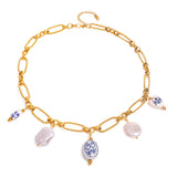 Lena - Gold necklace with stone embellishments.