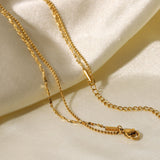 Helena – Delicate Gold Necklace with Geometric Pendant.