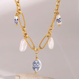 Lena - Gold necklace with stone embellishments.