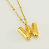Irena – Gold Necklace with Initial Charm