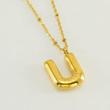 Irena – Gold Necklace with Initial Charm
