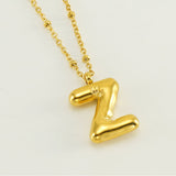 Irena – Gold Necklace with Initial Charm