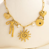 Emilie – Delicate Gold Necklace with Tiny Pendants