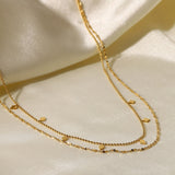 Helena – Delicate Gold Necklace with Geometric Pendant.
