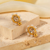 Theresa – Gold Earrings with Radiant Flowers