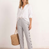Straight striped pants with side buttons