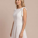 Embroidered short dress with bows