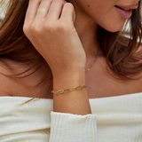Gold bracelet adorned with pearls