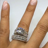 Wide diamond ring with a shiny finish.