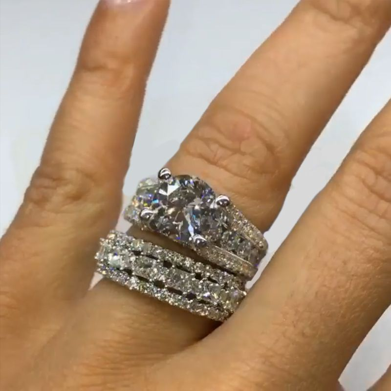 Wide diamond ring with a shiny finish.