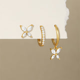 Patricia – Gold earrings with a delicate design.