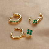 Amira – Gold earrings with structured design.