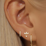 Sára – Delicate gold earrings with a subtle movement.